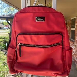 Kate Spade coral laptop backpack. Used once. In new condition.